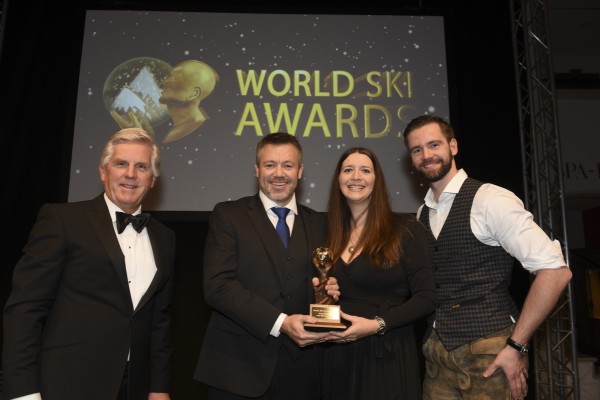 Tim and Nicole accepting Worlds Best Heli Ski Operation Award low rez3